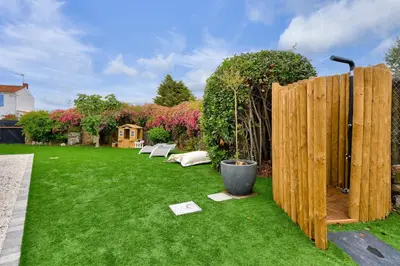 Jardin de l'établissement Coup de coeur - 200m plage - 6 adultes - 4 enfants