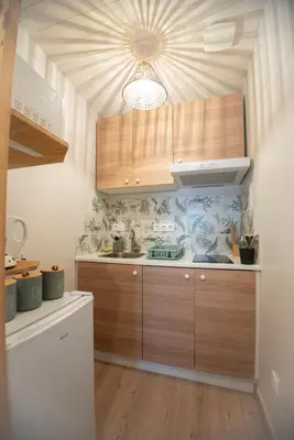 Cuisine ou kitchenette dans l'établissement L'échappée nocturne Nature et Zen