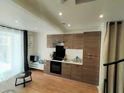 Cuisine ou kitchenette dans l'établissement Aux portes des Marais