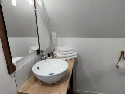 Salle de bains dans l'établissement Aux portes des Marais