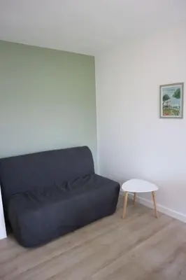 Coin salon dans l'établissement Petit gîte des trois chemins