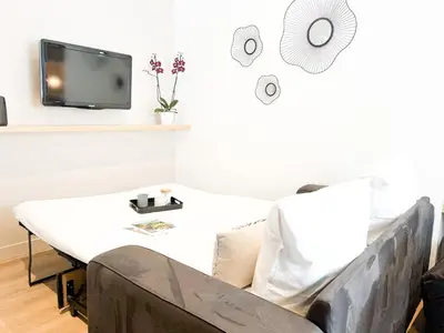 Télévision ou salle de divertissement dans l'établissement La Perle du Commando, 80m Front de mer