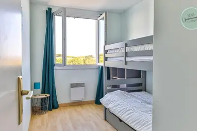 Un ou plusieurs lits dans un hébergement de l'établissement La Goëlette 30 Les mouettes