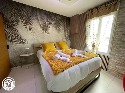 Un ou plusieurs lits dans un hébergement de l'établissement Gîte romantique avec spa et jardin à 1 km de l'Atlantique, proche Noirmoutier et plages - FR-1-426-554