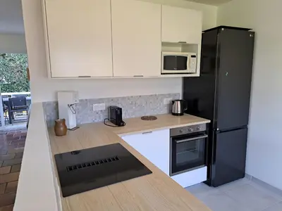 Cuisine ou kitchenette dans l'établissement Maison familiale de charme à Saint-Jean-de-Monts - WIFI - FR-1-323-546