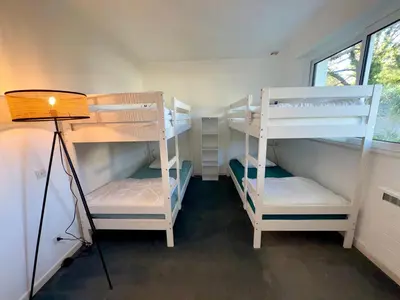 Un ou plusieurs lits dans un hébergement de l'établissement Maison familiale de charme à Saint-Jean-de-Monts - WIFI - FR-1-323-546