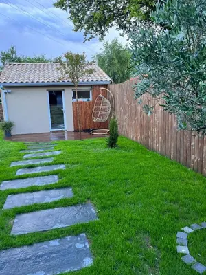 Jardin de l'établissement Dar Fafy studio cosy au calme à 15min de Nantes