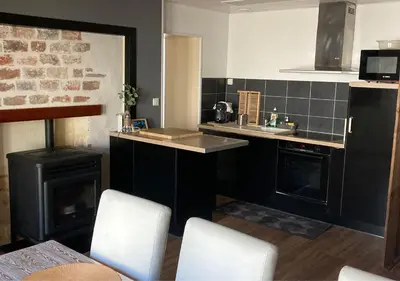 Cuisine ou kitchenette dans l'établissement Entre terre et mer