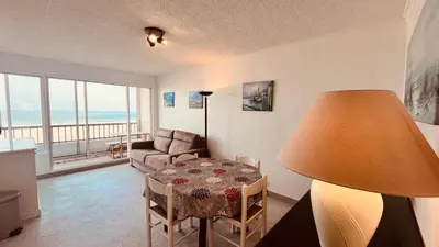 Coin salon dans l'établissement Appartement sable et océan