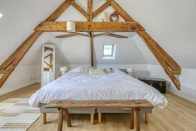 Un ou plusieurs lits dans un hébergement de l'établissement Gîte de l'Etoile, maison rénovée à 18min du PuyduFou