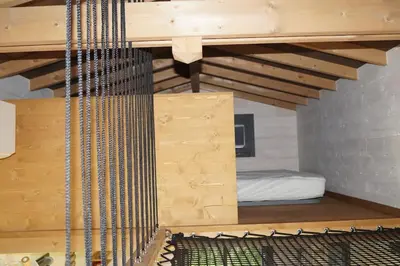 Un ou plusieurs lits dans un hébergement de l'établissement SPA & Tiny house à la campagne
