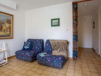 Coin salon dans l'établissement Holiday Home Le Moussaillon by Interhome