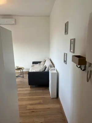 Un ou plusieurs lits dans un hébergement de l'établissement Studio à 5 min à pied de la mer