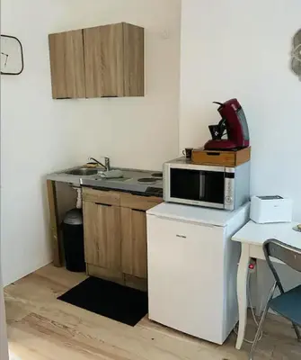 Cuisine ou kitchenette dans l'établissement Le phare de la cote ouest