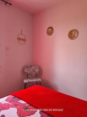 Un ou plusieurs lits dans un hébergement de l'établissement La Môme joli gîte à 15 min du Puy duFou