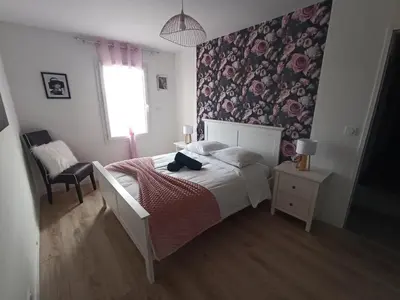 Un ou plusieurs lits dans un hébergement de l'établissement La Môme joli gîte à 15 min du Puy duFou