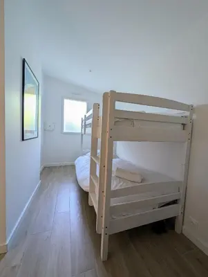 Un ou plusieurs lits dans un hébergement de l'établissement Havre de paix Maison rénovée avec jardin