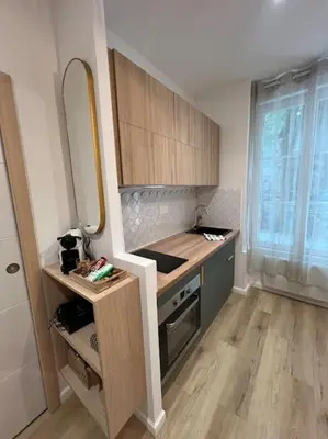 Cuisine ou kitchenette dans l'établissement L Ecrin Nantais