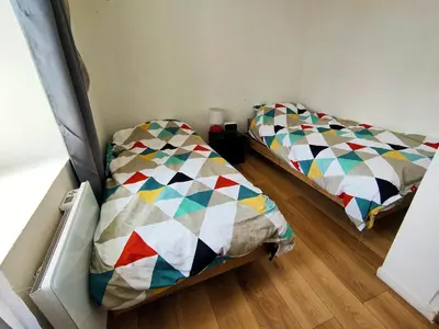 Un ou plusieurs lits dans un hébergement de l'établissement 2 chambres Centre Chateaubriant Sauna