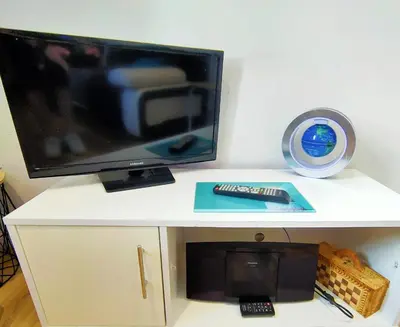 Télévision ou salle de divertissement dans l'établissement 2 chambres Centre Chateaubriant Sauna