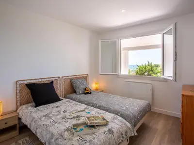 Un ou plusieurs lits dans un hébergement de l'établissement Holiday Home Le Bigorneau Préfaillais by Interhome
