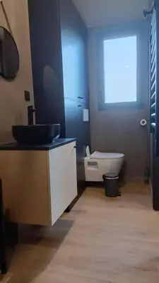 Un ou plusieurs lits dans un hébergement de l'établissement tiny house confort