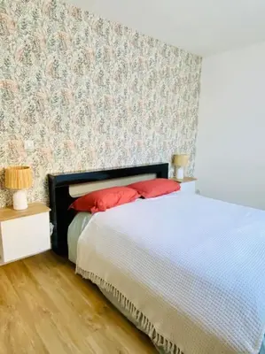 Un ou plusieurs lits dans un hébergement de l'établissement Maison à Cholet