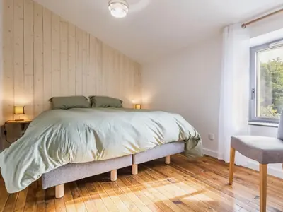 Un ou plusieurs lits dans un hébergement de l'établissement Ancien corps de ferme rénové avec jardin, terrasse et recharge EV, à 24 km de Nantes - FR-1-306-1282