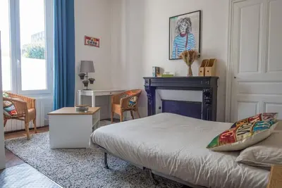 Un ou plusieurs lits dans un hébergement de l'établissement Le petit cosy