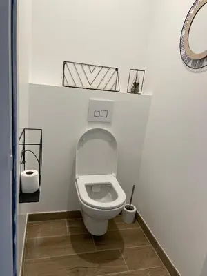 Salle de bains dans l'établissement Gîte climatisé DUNE ET PLAGE jqà 12 personnes
