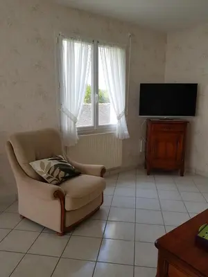 Télévision ou salle de divertissement dans l'établissement Maison individuelle An Ti Ruz