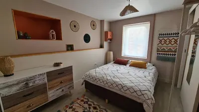 Un ou plusieurs lits dans un hébergement de l'établissement La Maison du Bord du Lac