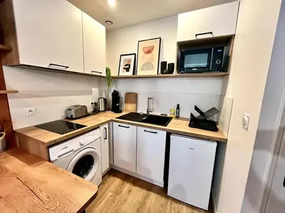 Cuisine ou kitchenette dans l'établissement Zola 2pers Tv