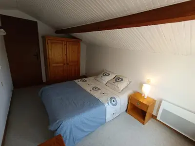 Un ou plusieurs lits dans un hébergement de l'établissement Gîte 'Chez René' - 10 min du PUY DU FOU