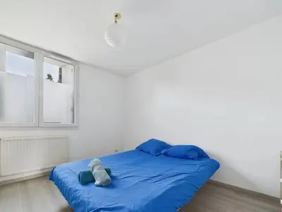 Un ou plusieurs lits dans un hébergement de l'établissement le blue - T3 à Nantes - Comme à la maison