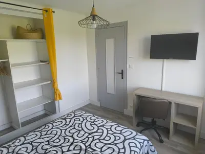 Un ou plusieurs lits dans un hébergement de l'établissement Chambre Gabare proche Nantes