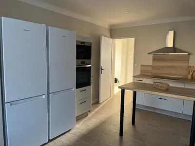Cuisine ou kitchenette dans l'établissement Villa chaleureuse 8 personnes - Nouveau