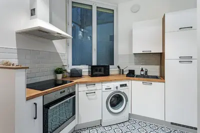 Cuisine ou kitchenette dans l'établissement Le mercoeur - Cocon paisible en hyper centre