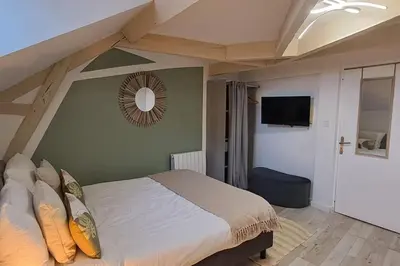 Un ou plusieurs lits dans un hébergement de l'établissement Studio NOTRE-DAME 3 cœur de ville