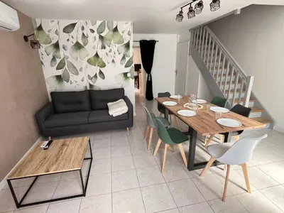 Coin salon dans l'établissement Maison du Colombier