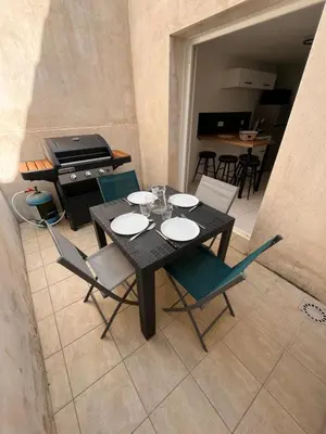 Coin salon dans l'établissement Maison du Colombier