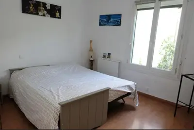 Un ou plusieurs lits dans un hébergement de l'établissement Le carré vert
