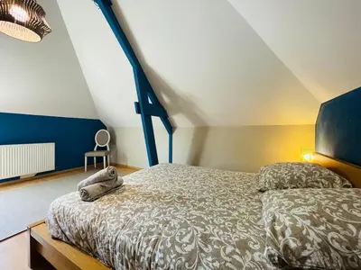 Un ou plusieurs lits dans un hébergement de l'établissement Casa Belle Rive