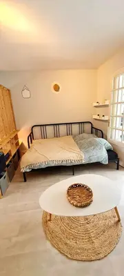 Un ou plusieurs lits dans un hébergement de l'établissement Évasion, Studio Cosy près de la Plage