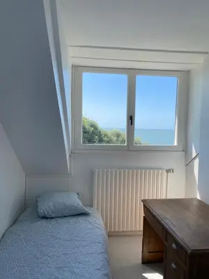 Un ou plusieurs lits dans un hébergement de l'établissement Maison face mer !