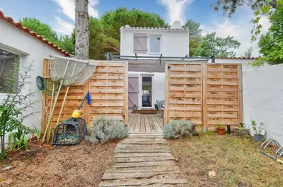 Jardin de l'établissement Jolie maison pour 7 - 300 m de la plage - Dunes