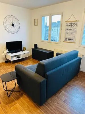 Télévision ou salle de divertissement dans l'établissement Appartement Escale Paquebot Confort et Élégance