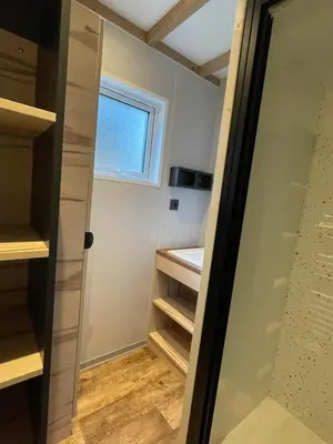Télévision ou salle de divertissement dans l'établissement Cottage Grand Fay à 10 min des plages