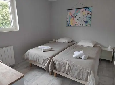 Un ou plusieurs lits dans un hébergement de l'établissement La Casa Bidule