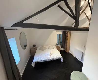 Un ou plusieurs lits dans un hébergement de l'établissement Loft de standing
